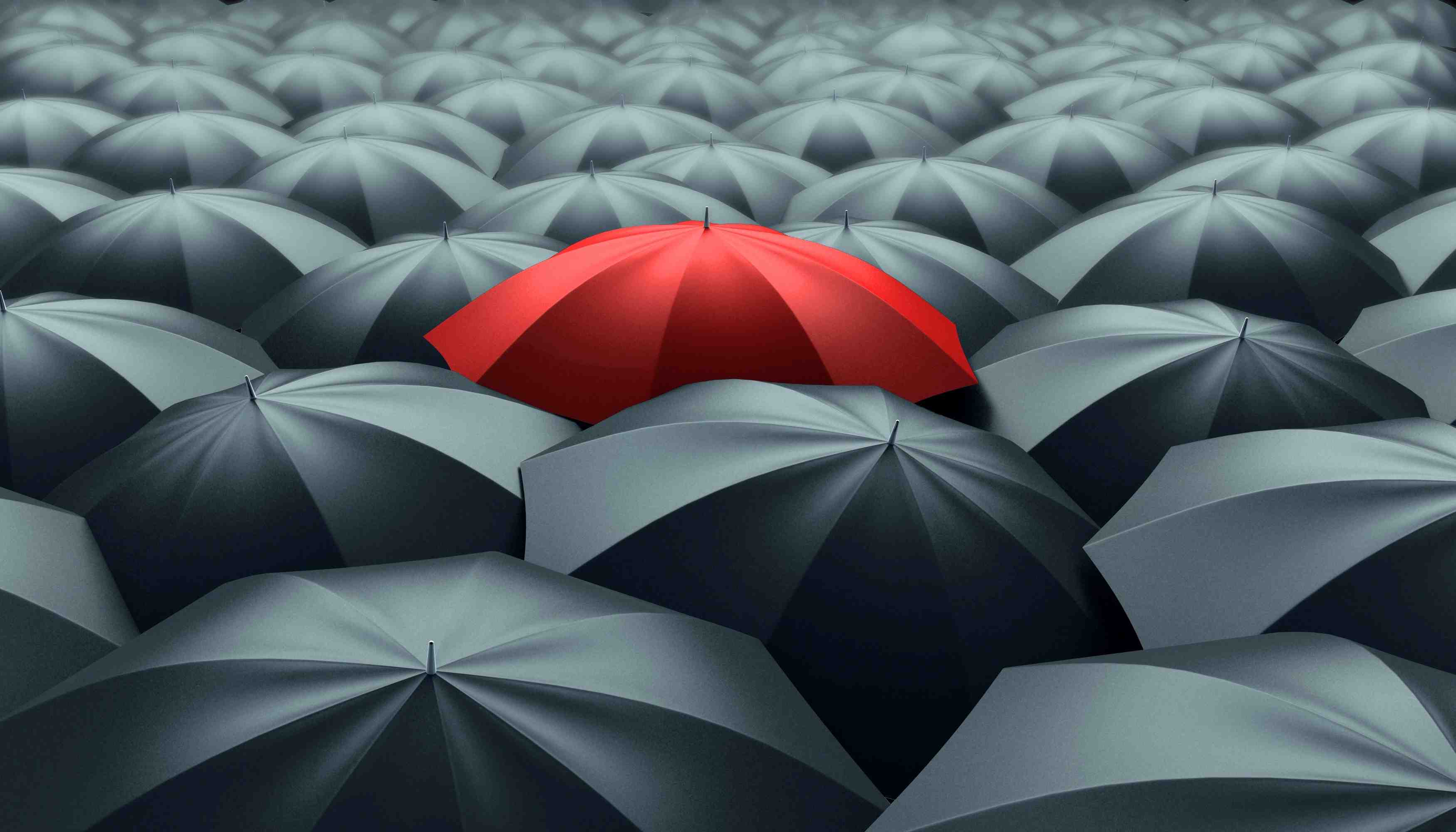Many umbrellas. One red.